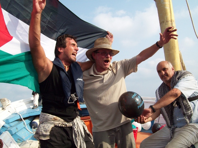 Vittorio Arrigoni, Captain John Klusmire, and Ren Tawil celebrate their arrival in Gaza (August 2008)